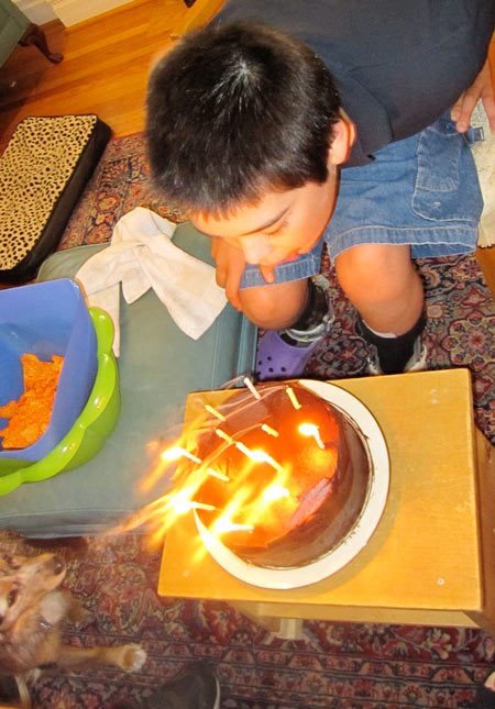 Jon blowing out his candles