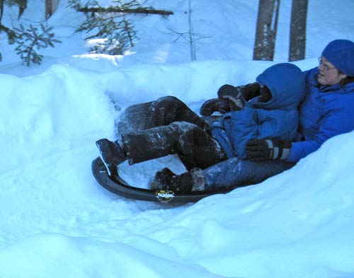 Jon and Laura bank tightly on the luge run
