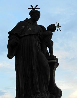Funky-headgear saint on Charles Bridge