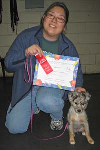 Laura and Photon with certificate and ribbon