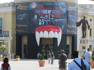 Ride entrance with vampire fangs and sign reading In 5D