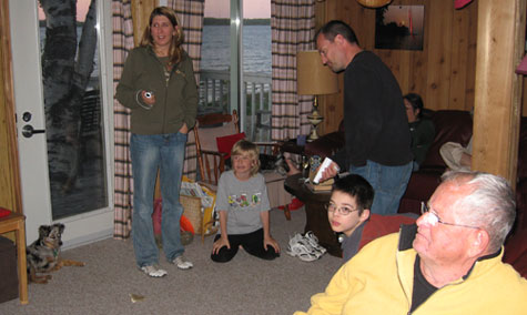 Family group, two holding Wii controllers