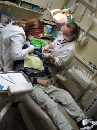 Jon relaxed in dental chair in the middle of the procedure