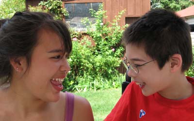 Jon and Midori looking at each other