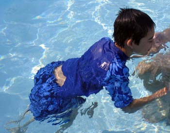 Jon stepping in pool