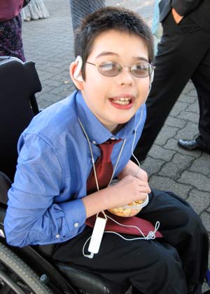 Jon having a quick snack in a tie